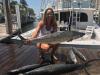 Ashlee with some big kingfish caught on a Fishing Headquarters sportfishing charter.jpeg